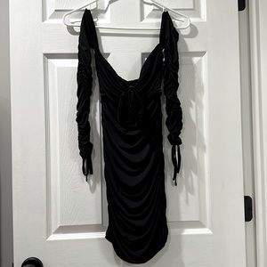 Flattering black mini dress perfect for a night out